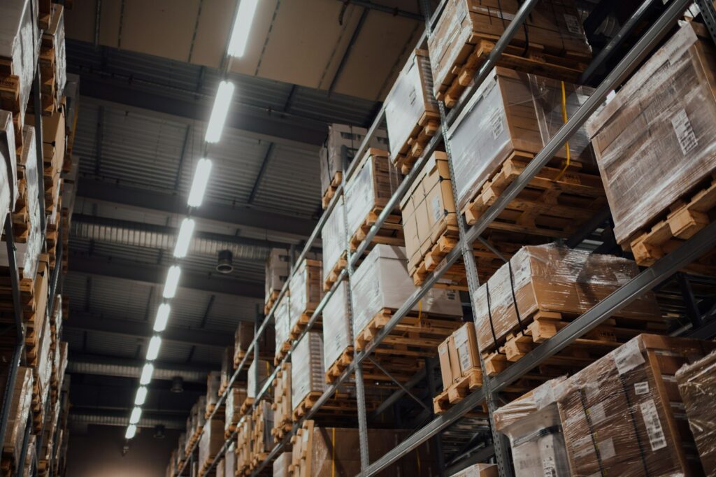 Warehouse racking with cardboard boxes